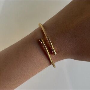 Gold twisted bangle